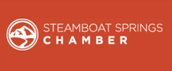 Logo of Steamboat Springs Chamber featuring white mountain and skier icon on red background.